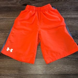 Under Armour youth small, loose fit orange shorts